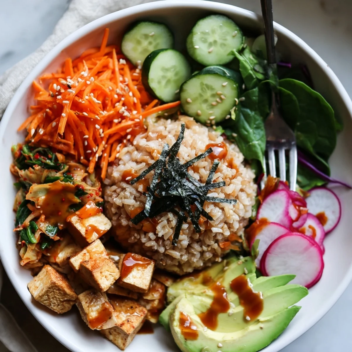 Vibrant fermented vegetable bowl with tangy kimchi, fresh greens, and hearty grains.  