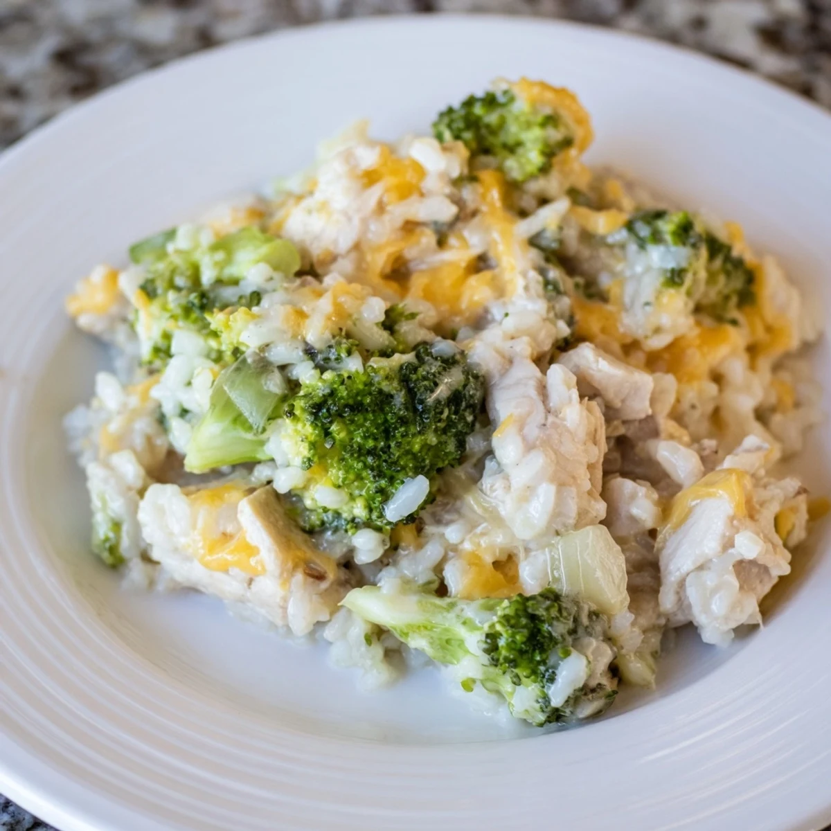 Golden Chicken & Broccoli Rice Casserole bubbling hot, perfect for a cozy, satisfying family dinner.
