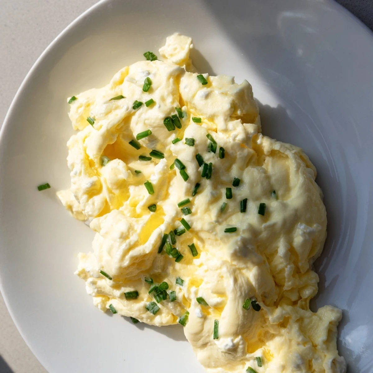 Fluffy Cottage Cheese Scrambled Eggs, a golden breakfast, ready to be enjoyed with toast.