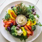 Festive platter: This beautiful Garland Veggie Wreath recipe offers a healthy, colorful appetizer for your guests.