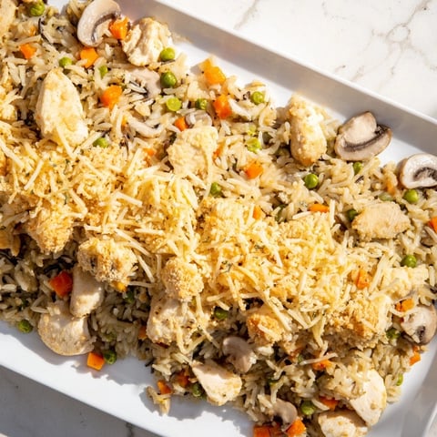 Golden brown Chicken and Wild Rice Bake, bubbly from the oven, ready for serving.