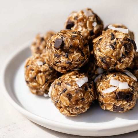 Chewy almond-chia energy bites, naturally sweetened and speckled with mini chocolate chips.