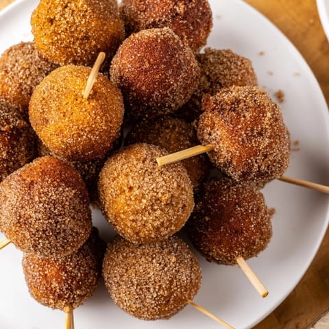 Bite-sized cinnamon sugar maple ginger muffin pops ideal for snacks or desserts.  