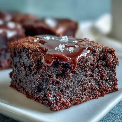 Decadent chocolate brownies made with tangy sourdough discard, finished with a sprinkle of flaky sea salt.