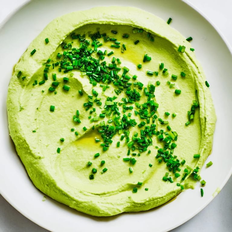 Freshly blended Avocado Cottage Cheese Dip, a protein-packed, flavorful dip, great for entertaining.